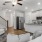 a living room with white furniture