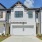 white houses with garages