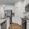 a kitchen with white cabinets