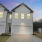 white houses with garages