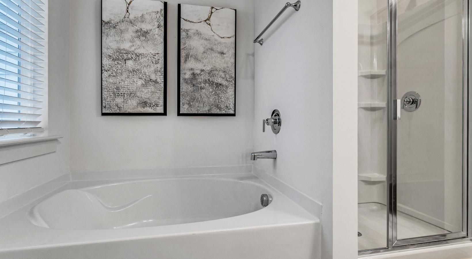 Bathroom options with thoughtful details a bathroom with a bathtub and a shower