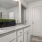 a bathroom with a marble countertop