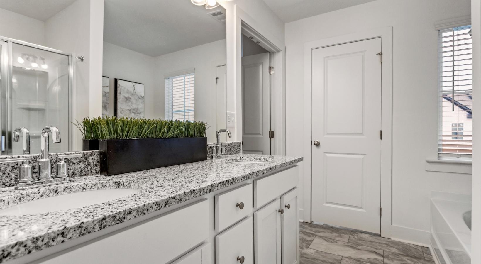 Spacious bathrooms with everything you need a bathroom with a marble countertop
